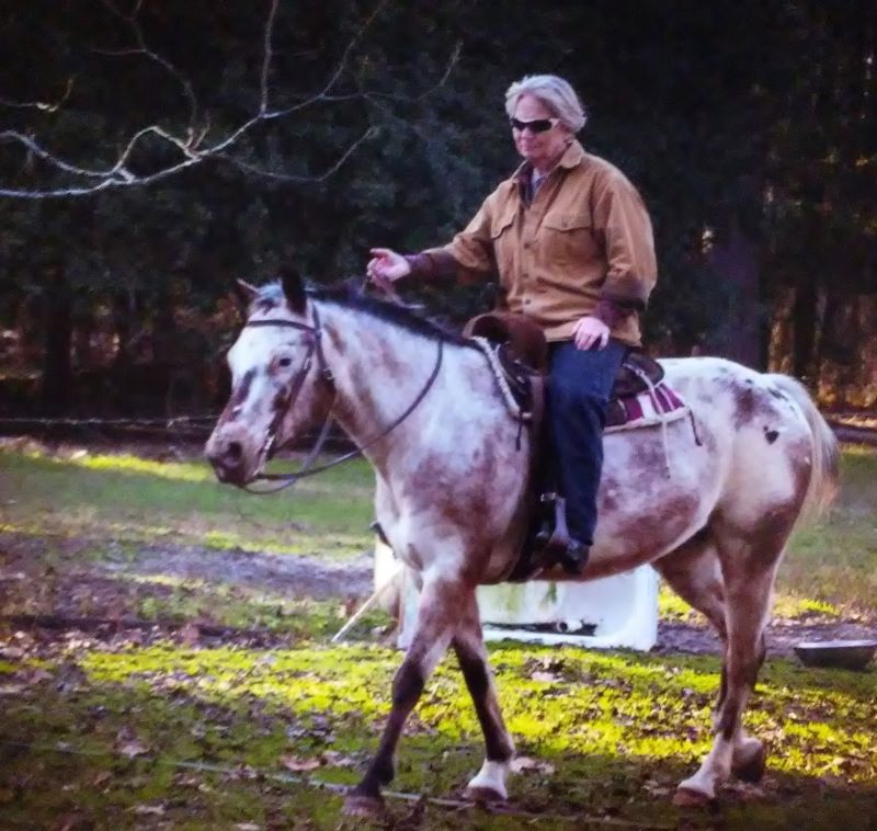 Dot Goodwin riding her horse, Cloud
